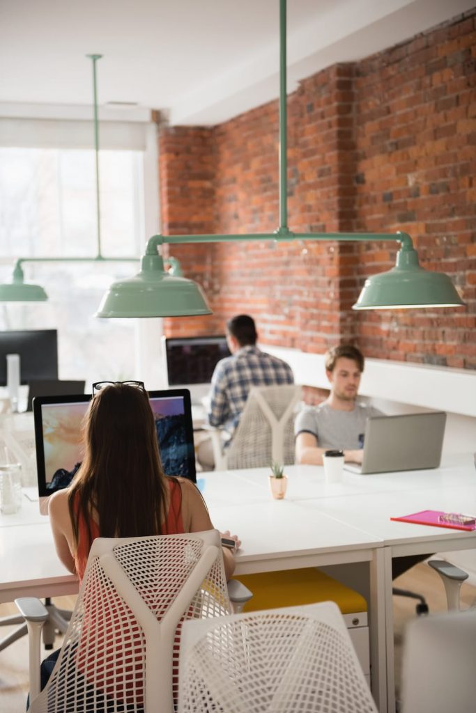 female executive working on computer in office BWRDXJA